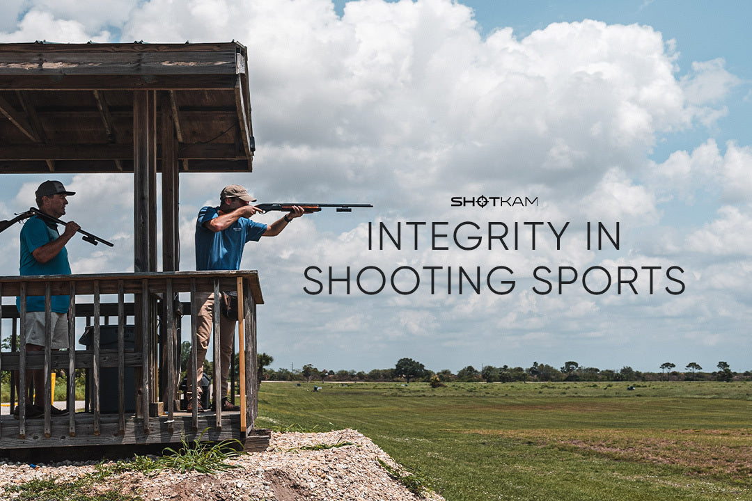 Two men practicing clay shooting at a shooting range, embodying integrity in shooting sports with ShotKam equipment in the USA.