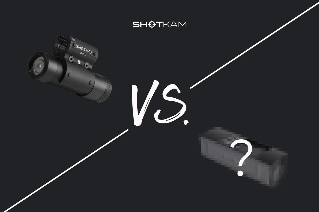 ShotKam comparison image showing a ShotKam camera on the left and a blurred mystery product on the right with a question mark. The text 'VS.' is in the center with the ShotKam logo at the top.