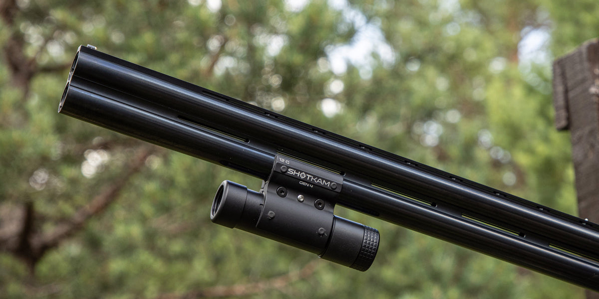 ShotKam Gen 4 mounted to a over and under shotgun barrel to capture 4k video of sporting clays and trap shooting
