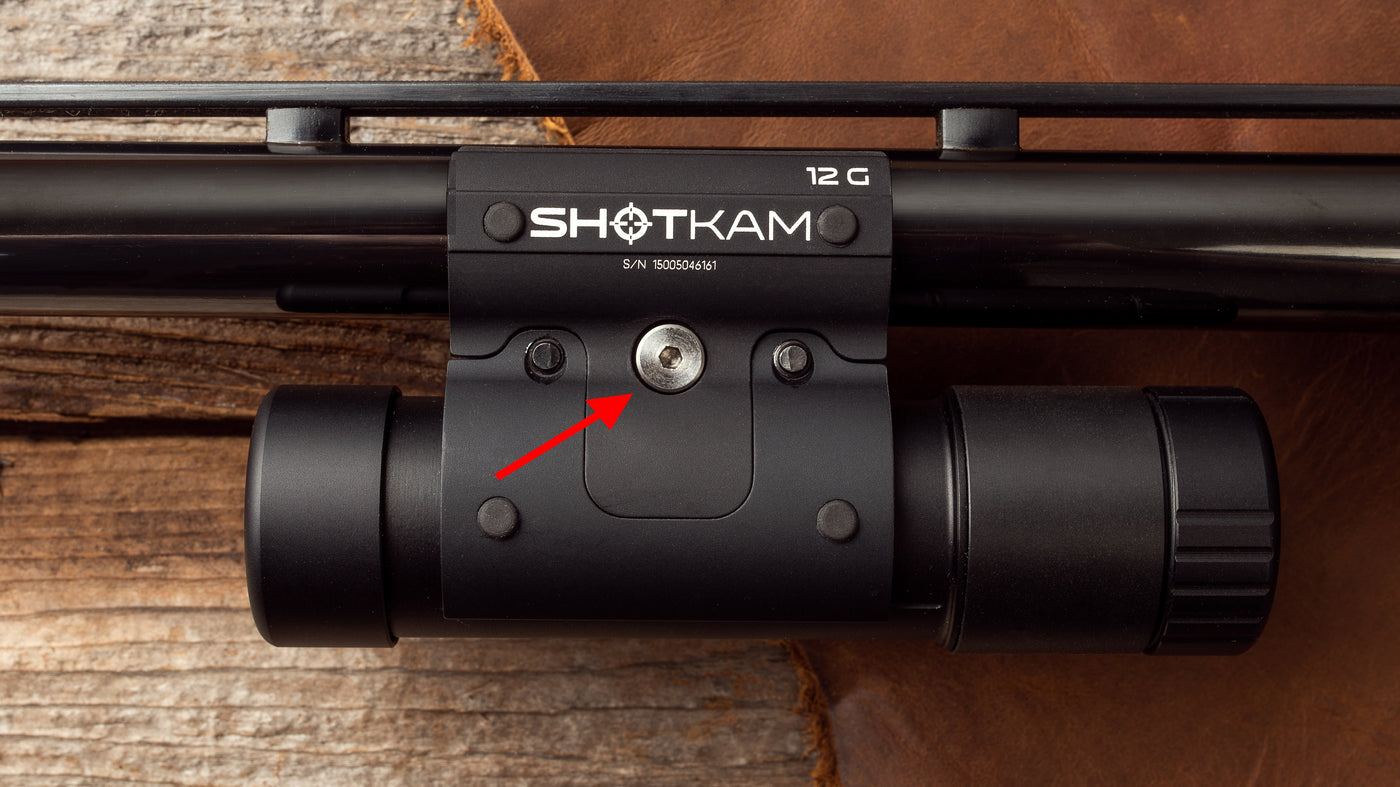 of ShotKam camera mounted on a shotgun featuring a stainless steel silver screw for the Ideal for hunters and shooting this setup ensures and fast mounting for capturing every shot